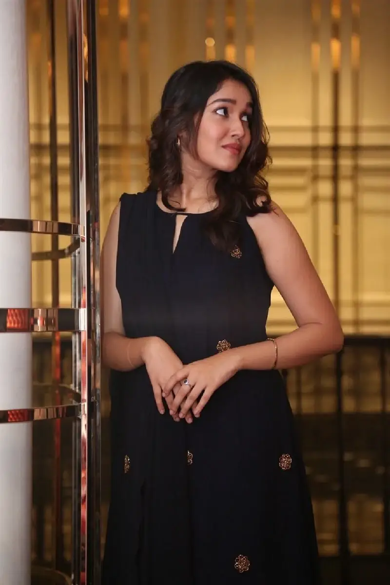 Actress Anikha Surendran in Black Dress at Butta Bomma Movie Trailer Launch